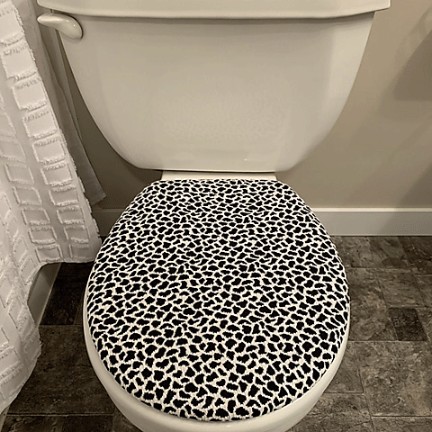 black and white toilet lid cover