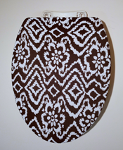 brown and white toilet seat lid cover